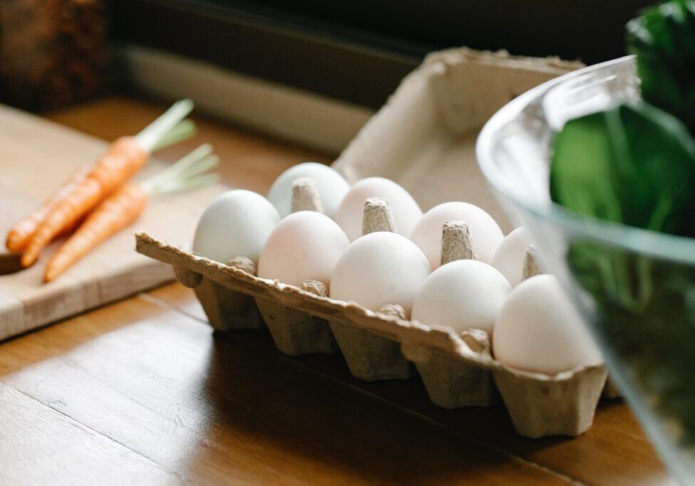 Eggs in a carton for high-protein diet options.